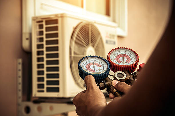 Professional Hvac technician working in Babson Park, MA